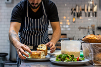 image of chef plating food